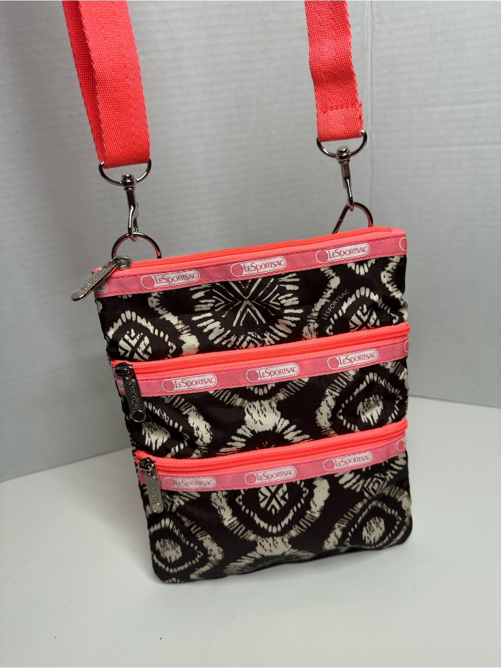 Lesportsac Black & Cream Pattern Crossbody with Coral Pink Trim